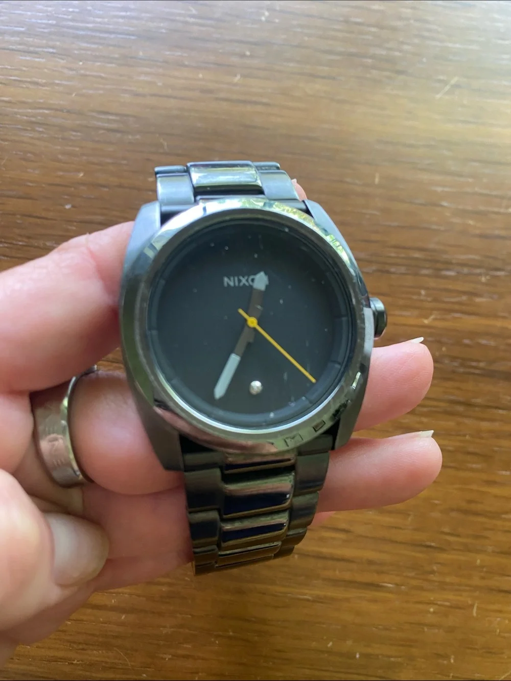 Nixon Black Dial Stainless Steel Watch with Yellow Second Hand